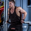 Elevate your workout style with the Gorilla Wear Evansville Black Gym Tank Top. A classic Muscle Stringer designed for men, crafted with premium materials for comfort and durability. Perfect for the modern fitness enthusiast seeking a blend of style and performance. Shop Online in UAE at MG Activewear. 