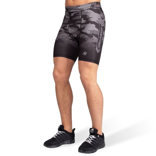 Explore the Gorilla Wear Franklin Fight Shorts in Dark Camo, designed for fighters and athletes. These compression shorts feature dry-fit technology and advanced stretch fabric, providing exceptional muscle support to reduce the risk of injury. The compression fit improves blood circulation, enhancing overall performance. Shop online in UAE for these top-tier compression shorts and take your training to the next level